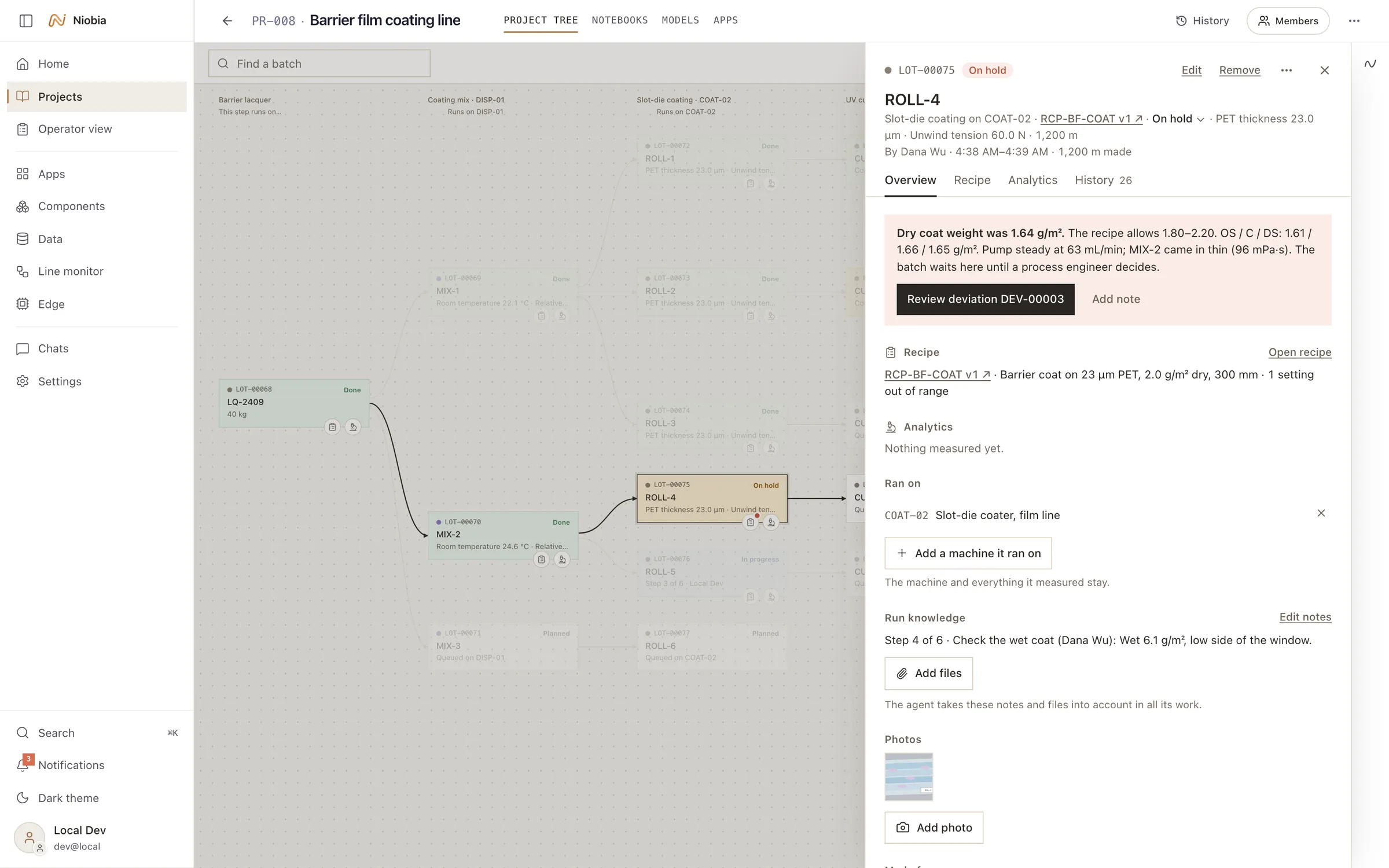 Lab OS: a held roll traced through its genealogy, with the reason it was held.